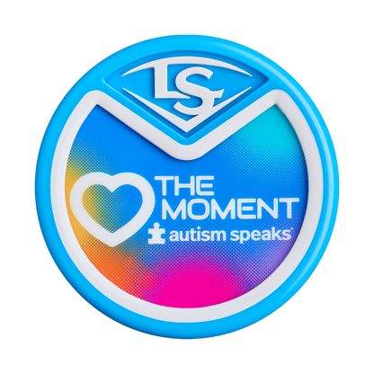A circular blue badge with a white heart outline, "THE MOMENT" and Autism Speaks text on a colorful gradient, featuring the 2026 Louisville Slugger Select PWR Love the Moment (-3) BBCOR Baseball Bat: WBL4181010 logo at the top.