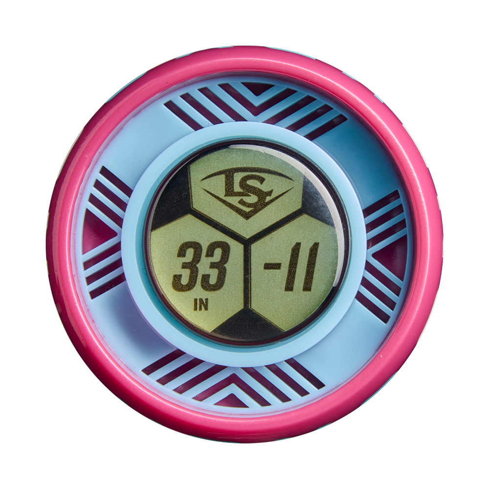 A round object with pink and blue patterns and a central green hexagon marked LS, 33 IN, and -11 in gold text—mimicking the vibrant design of the 2027 Louisville Slugger Kryo One (-11) Fastpitch Softball Bat (WBL4272010), a one-piece composite bat from Louisville Slugger.