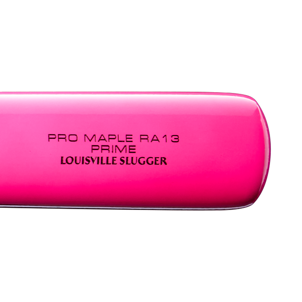 Close-up of a vibrant pink Louisville Slugger Pro Prime RA13 Sunset Maple Wood Baseball Bat (WBL4297010) engraved with PRO MAPLE RA13 PRIME and LOUISVILLE SLUGGER in black text on a white background, highlighting the Professional Series Finish for the ultimate pro-level experience.