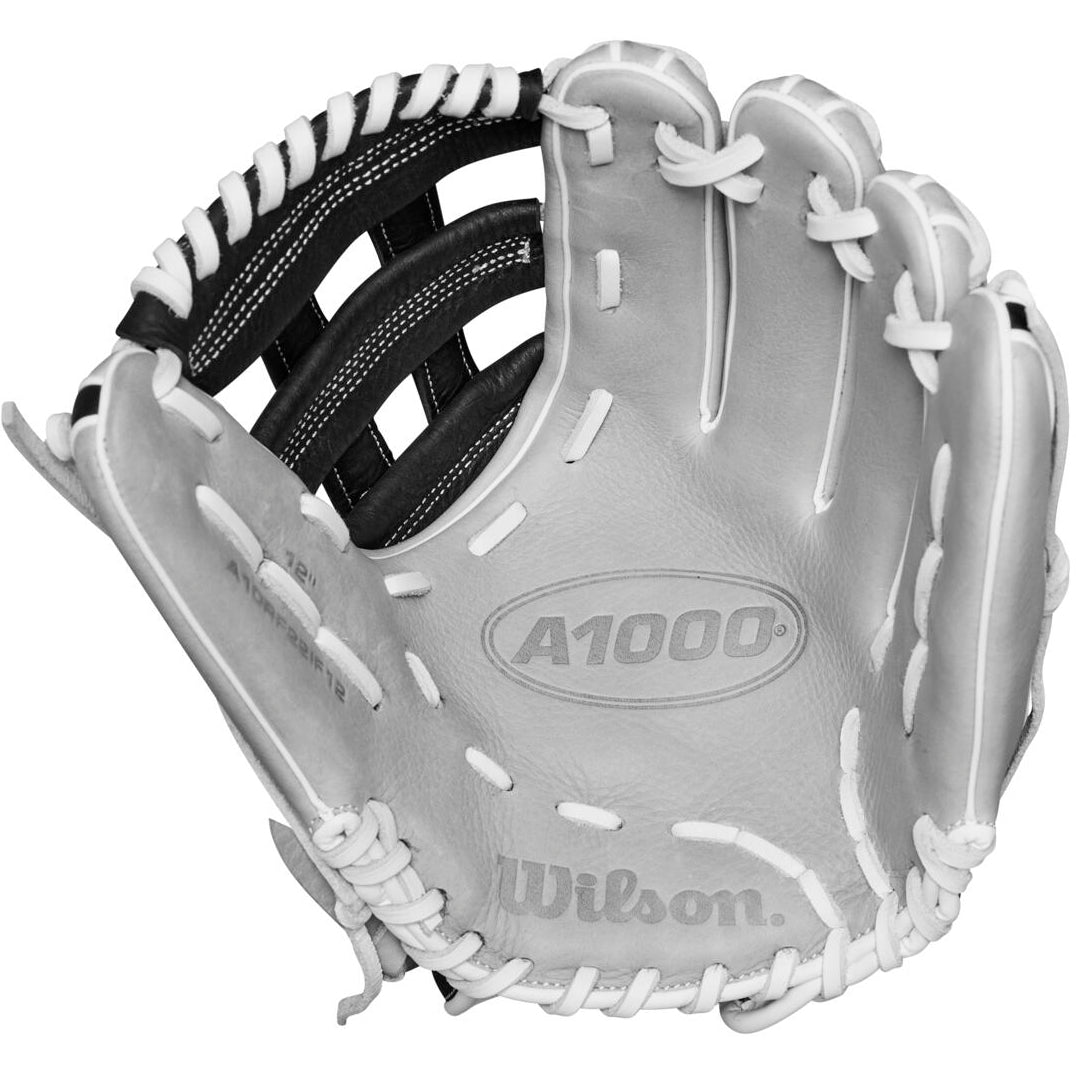 The Wilson A1000 IF12 12" Fastpitch Glove (WBW10145612) by Wilson features white leather, black accents, and white laces with an embossed logo—ideal for youth players seeking a dependable softball infield glove.