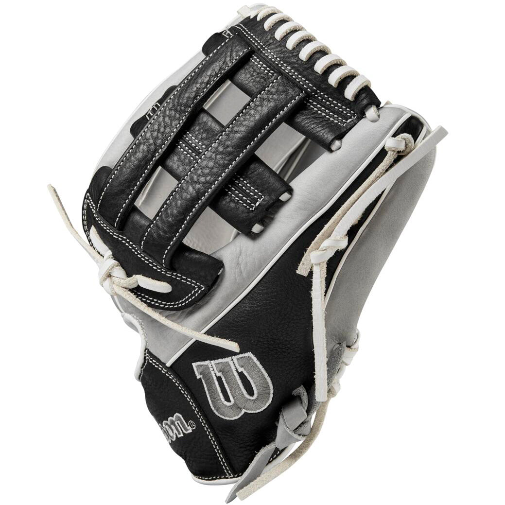 The Wilson A1000 IF12 12" Fastpitch Glove (WBW10145612) is a black and white glove with white stitching and laces, a woven web design, and the Wilson logo displayed on the thumb.