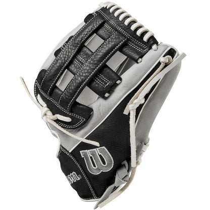 The Wilson A1000 IF12 12" Fastpitch Glove (WBW10145612) is a black and white glove with white stitching and laces, a woven web design, and the Wilson logo displayed on the thumb.