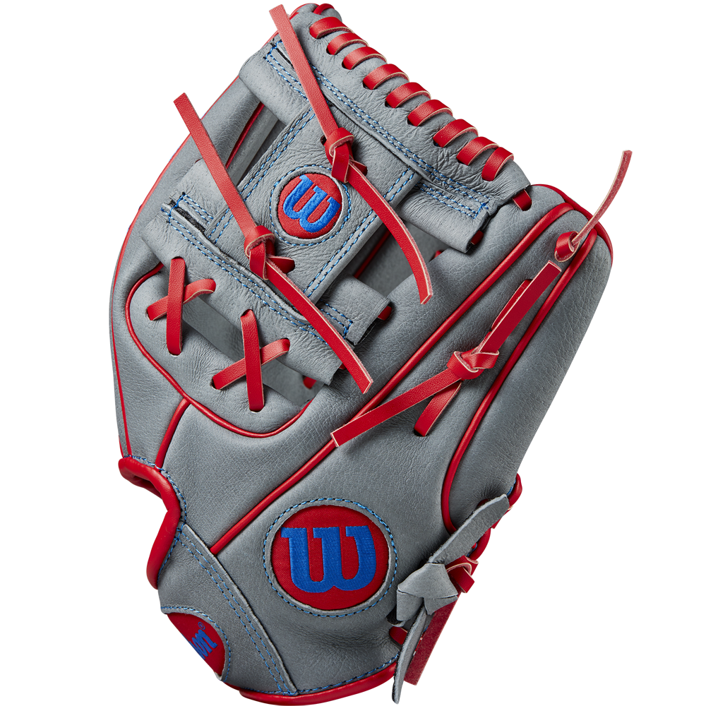 The Wilson A450 10.75" Baseball Glove (WBW1014711075) is a youth infield glove with red and blue stitching, made from durable top grain leather.