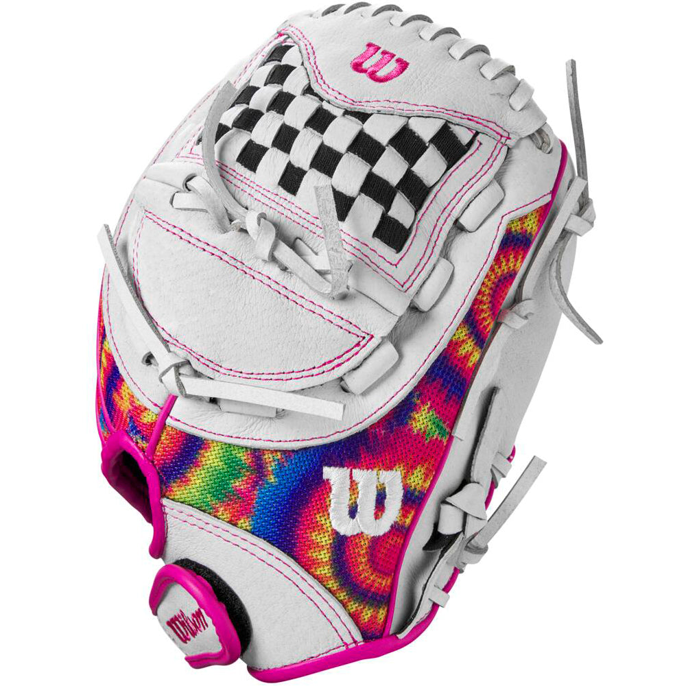 The Wilson Flash 11.5" Fastpitch Glove (WBW101640115) features a white design with pink accents, black-and-white checkerboard webbing, and tie-dye sides—ideal for youth softball players seeking standout style on the field.
