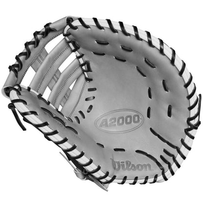 A Wilson A2000 1620SS 12.5" SuperSkin Fastpitch First Base Mitt (WBW101644125) shown from above highlights the pocket and webbing, featuring black lacing, Pro Stock leather, and embossed Wilson branding inside.