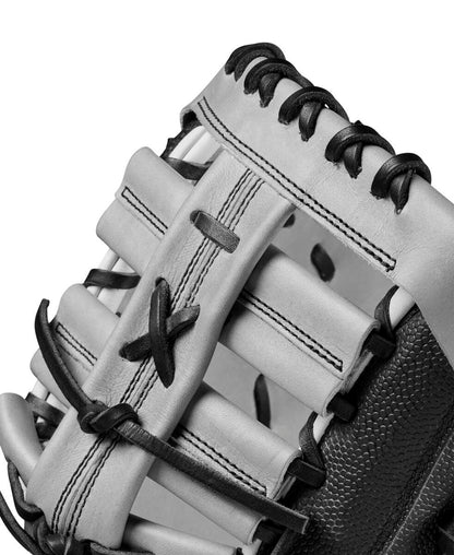 Close-up, black-and-white image of the Wilson A2000 1620SS 12.5" SuperSkin Fastpitch First Base Mitt (WBW101644125) highlighting its detailed stitching, lacing, and premium Pro Stock leather craftsmanship.