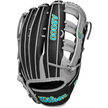 The Wilson A2000 SP13SS 13" SuperSkin Slowpitch Glove (WBW10164613) features a black and gray design with teal and yellow accents, Pro Stock leather construction, and Wilson A2000 branding.