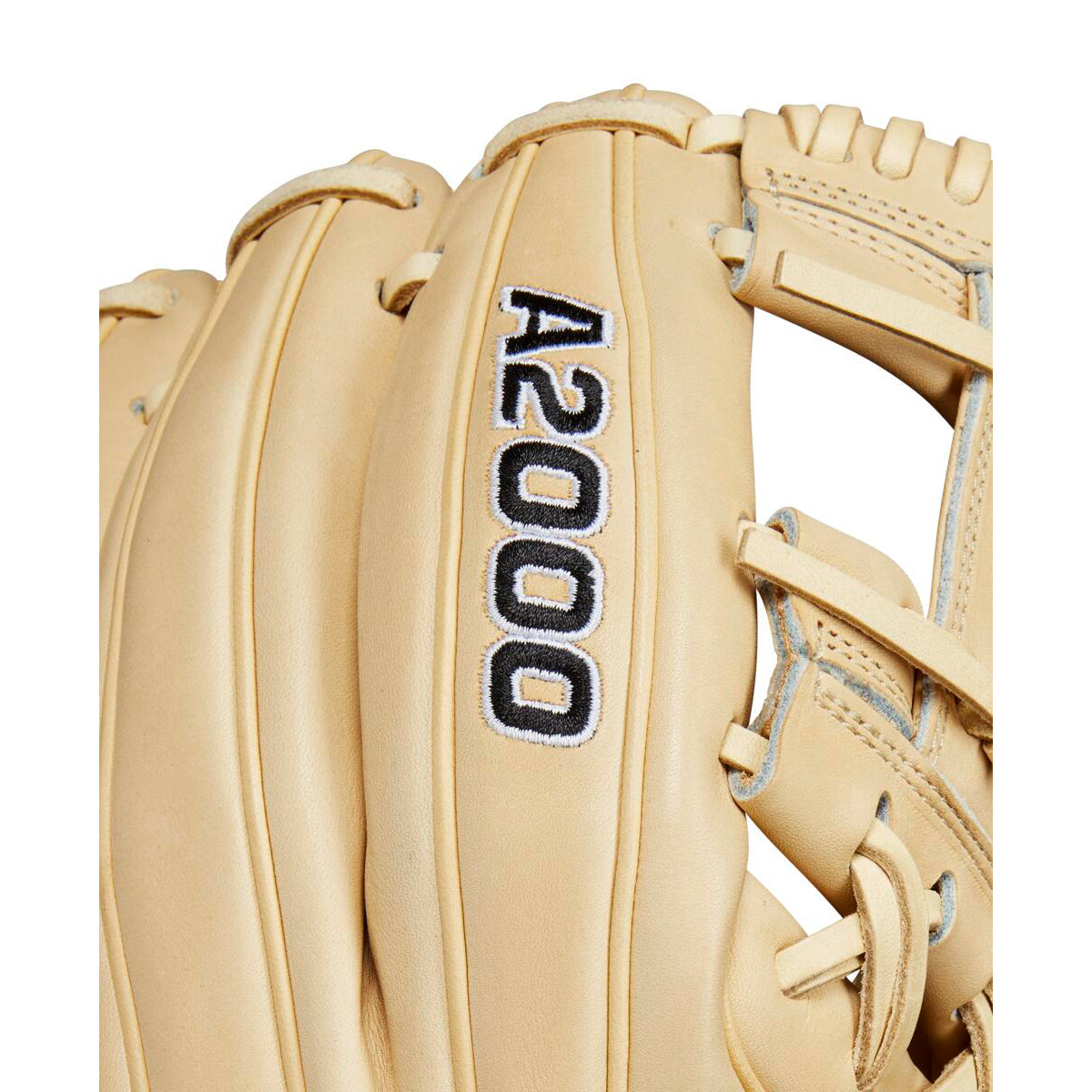 A close-up of the Wilson A2000 1786 11.5" Baseball Glove, crafted from Pro Stock leather, with "A2000 1786" embroidered in black and white on one finger, showing detailed stitching and lacing.
