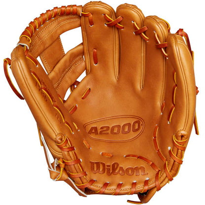A tan Wilson A2000 1786 11.5" baseball glove (WBW102073115) is shown open and facing forward, featuring orange laces, visible branding, and premium Pro Stock leather interior.