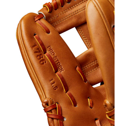Close-up of a tan Wilson A2000 1786 11.5" Baseball Glove, model WBW102073115, highlighting detailed stitching and embossed text reading "1786," "PRO STOCK," and "11.5" on premium Pro Stock leather.