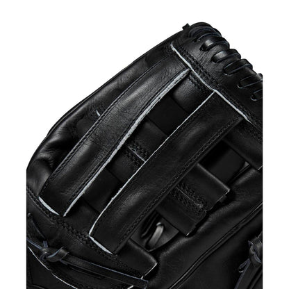 Close-up of the Wilson A2000 DW5 12" Baseball Glove (WBW10207712) in black, crafted from Pro Stock leather with detailed stitching and Dual Post Web laces on the webbing and edges.