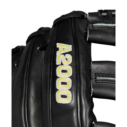 Close-up of the Wilson A2000 DW5 12" Baseball Glove (WBW10207712) by Wilson, featuring black Pro Stock leather, Dual Post Web design, and yellow and white A2000 embroidery with visible webbing and lacing details.