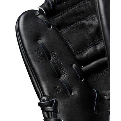 Close-up of the Wilson A2000 B2 12" Baseball Glove (WBW10208012) in black, crafted from Pro Stock leather with detailed stitching and embossed Pro Stock and D2 markings. Premium pitcher’s glove by Wilson.
