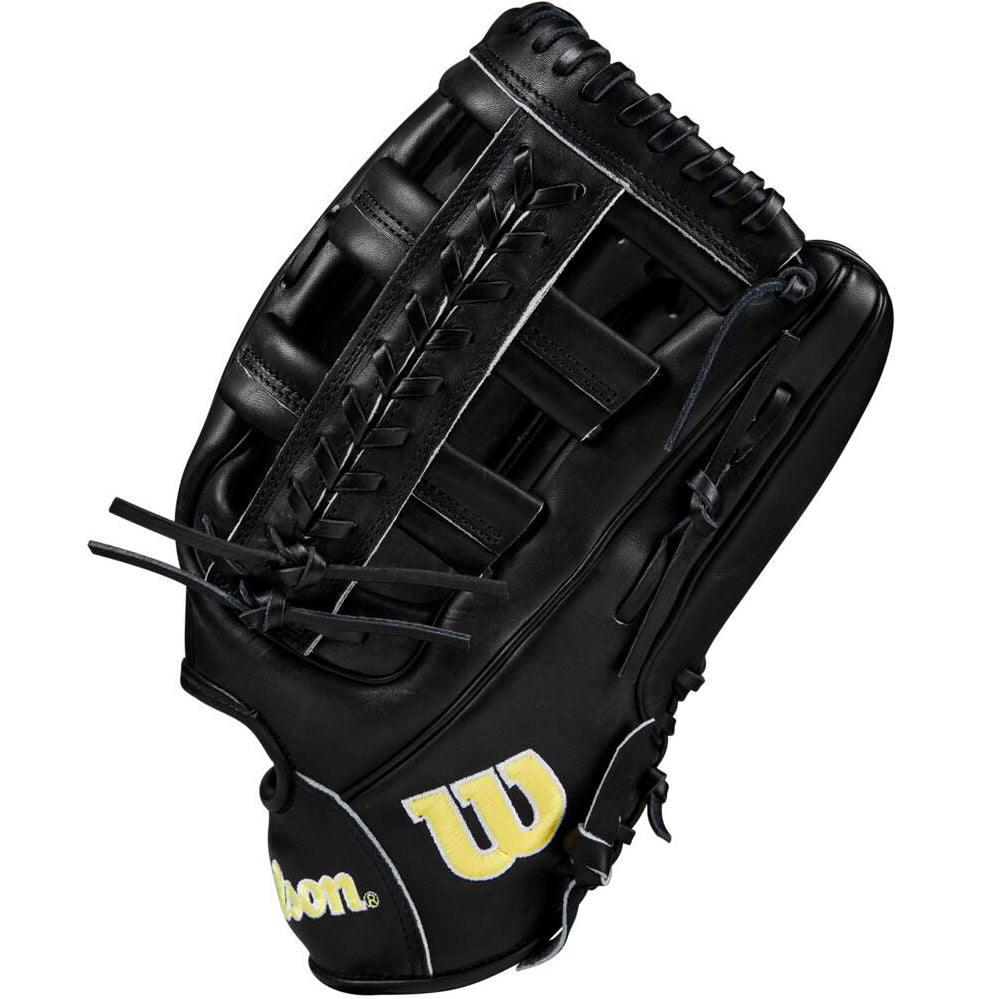 The Wilson A2000 1810 12.75" Baseball Glove (WBW1020831275) features black Pro Stock leather, tan stitching, a yellow W logo, laced webbing, and premium craftsmanship for lasting outfield performance.