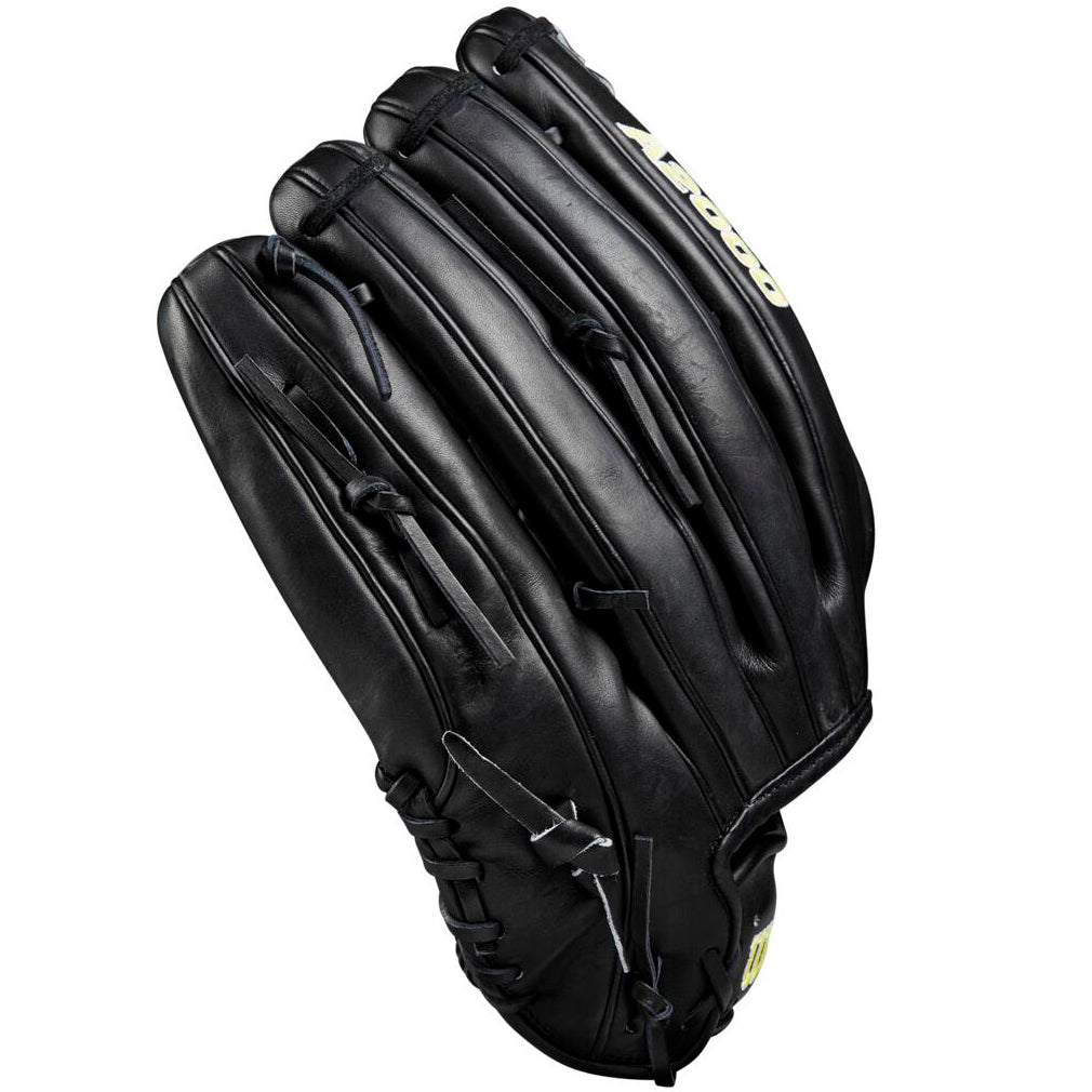 A Wilson A2000 1810 12.75" black baseball glove (WBW1020831275) with visible stitching, laces, and a yellow-and-white logo is shown against a white background, made from Pro Stock leather.