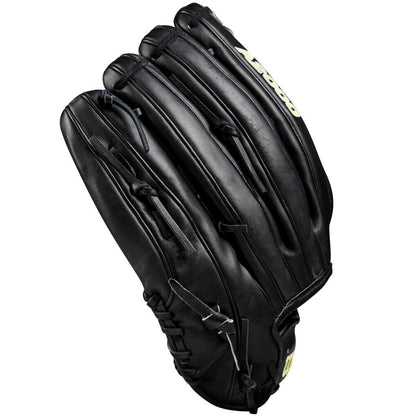 A Wilson A2000 1810 12.75" black baseball glove (WBW1020831275) with visible stitching, laces, and a yellow-and-white logo is shown against a white background, made from Pro Stock leather.
