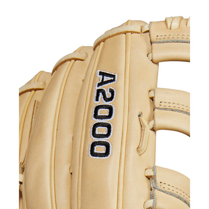 Close-up of a tan Wilson A2000 1810 12.75" Baseball Glove (WBW1020881275) with black and white "A2000" embroidery, detailed stitching, and lacing.