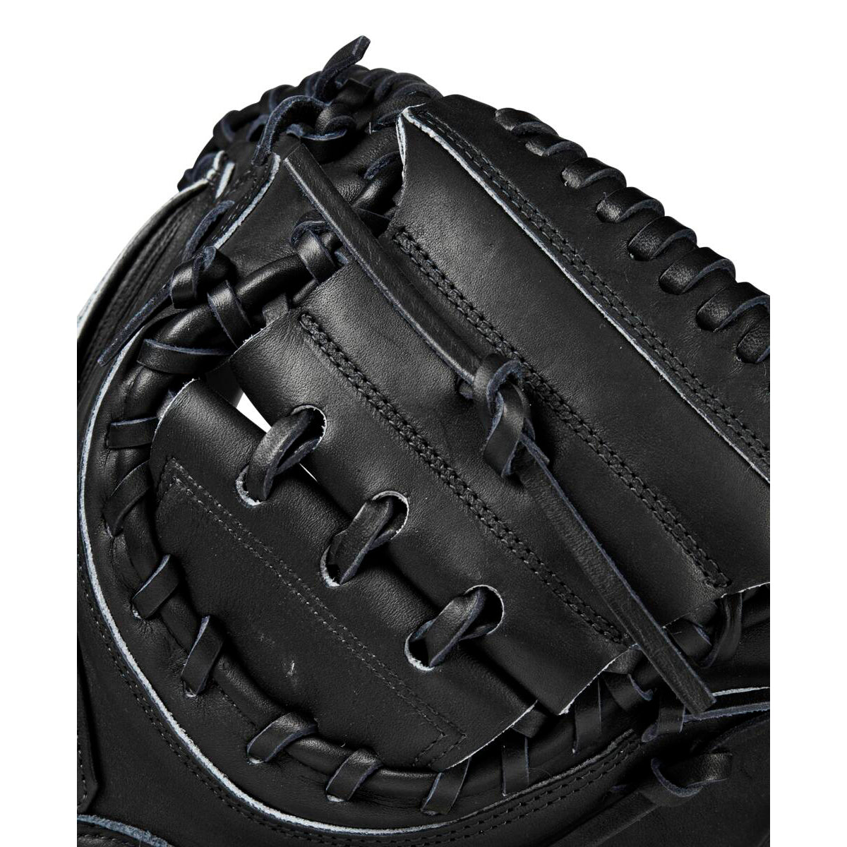 Close-up of the Wilson A2000 M23 33.5" Baseball Catcher's Mitt (WBW102092335), crafted from Pro Stock leather, highlighting its detailed stitching and laces against a white background.