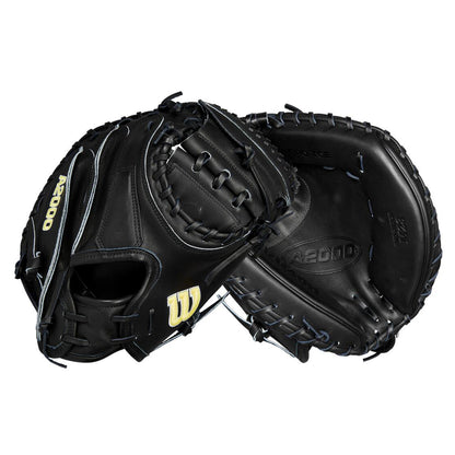 Two Wilson A2000 M23 33.5" Baseball Catcher's Mitts (WBW102092335) are shown in black Pro Stock leather with black laces and the yellow Wilson W logo on the wrist strap, displaying both palm and back sides.