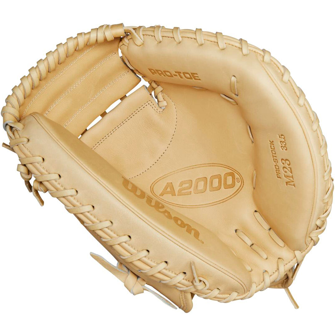 The Wilson A2000 M23 33.5" Baseball Catcher's Mitt (WBW102093335) from Wilson features Pro Stock leather, visible stitching and branding, plus PRO-STOCK and M23 33.5” markings on the palm area.
