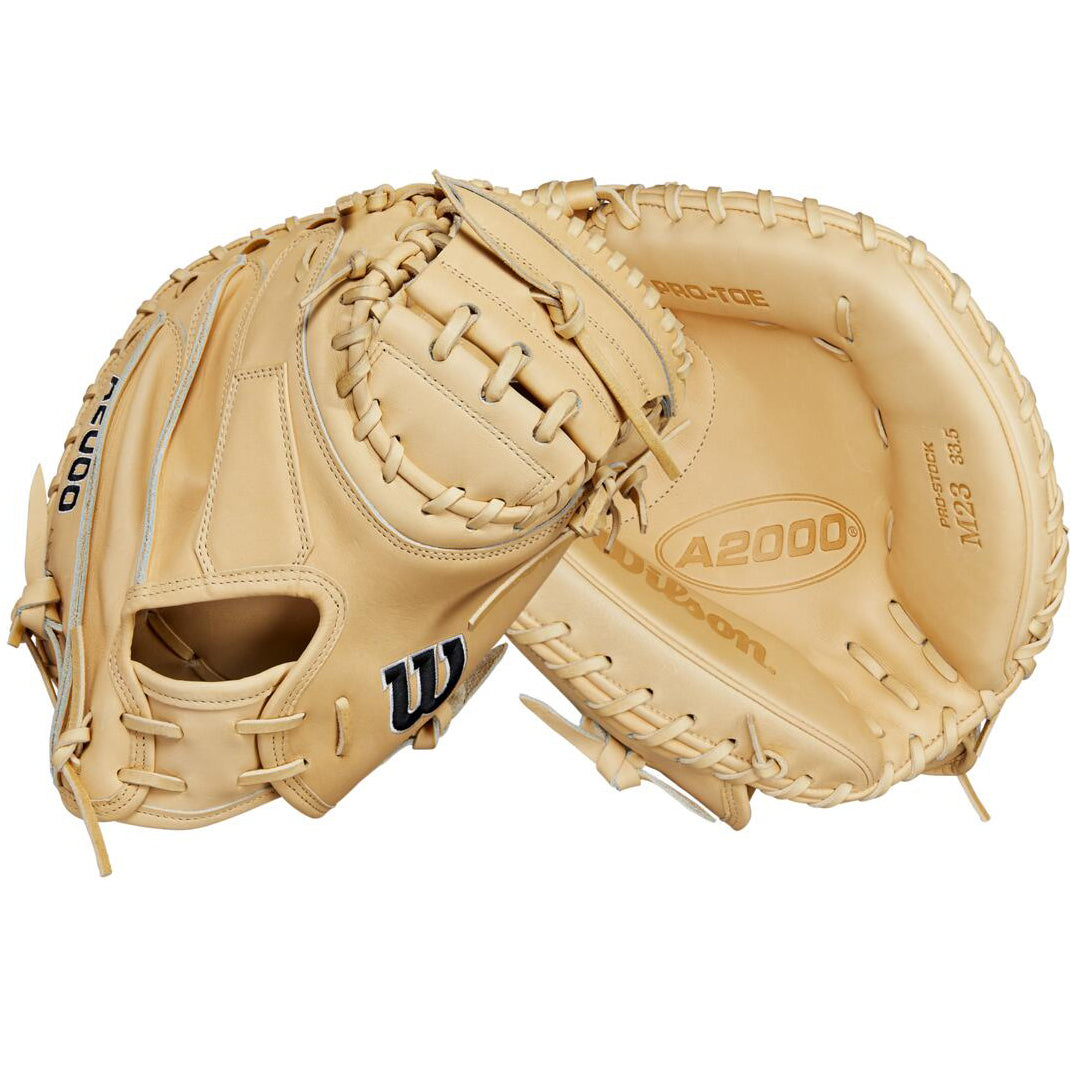 A Wilson A2000 M23 33.5" catcher's mitt (WBW102093335) is shown open, highlighting its detailed stitching, lacing, deep pocket, and the W and A2000 logos on premium Pro Stock leather.