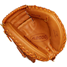 A Wilson A2000 M23 33.5" Baseball Catcher's Mitt (WBW102094335) in tan Pro Stock leather, featuring visible lacing and palm-side "PRO-TOE" and "M23" labels, is shown from the palm view.