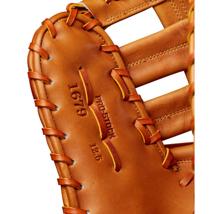 A close-up of the Wilson A2000 1679 12.5" Baseball First Base Mitt (WBW102099125) highlights the premium Pro Stock leather and signature Wilson craftsmanship.