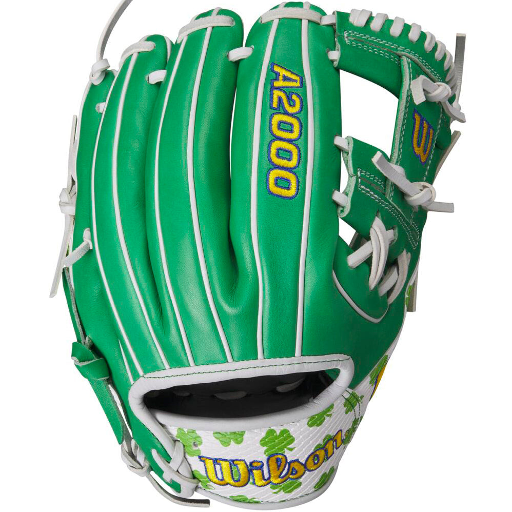 The Wilson A2000 1786 11.5" MDA Shamrocks Baseball Glove (WBW102148115) features green Pro Stock leather, white laces, clover designs, and yellow-and-blue Wilson logos for top durability and infield performance.