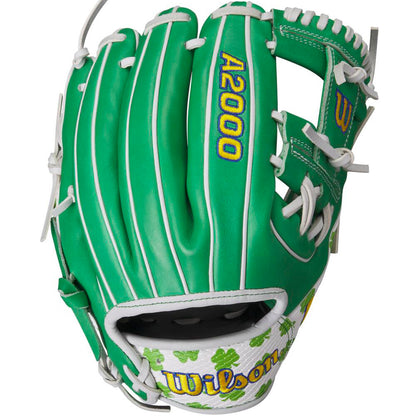 The Wilson A2000 1786 11.5" MDA Shamrocks Baseball Glove (WBW102148115) features green Pro Stock leather, white laces, clover designs, and yellow-and-blue Wilson logos for top durability and infield performance.