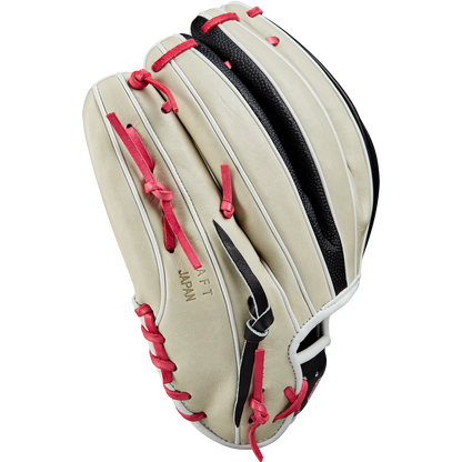 The Wilson A2K 1724 11.75" Baseball Glove (GOTM June 2024) in beige with red laces, black webbing, and white trim, made from Pro Stock Select leather, displays JAPAN and AFT embossed on the side against a plain white background.