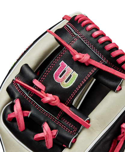 Close-up of the Wilson A2K 1724 11.75" Baseball Glove (GOTM June 2024, WBW1022571175) featuring black and cream Pro Stock Select leather, red stitching and laces, plus a green and white embroidered W logo on the back.
