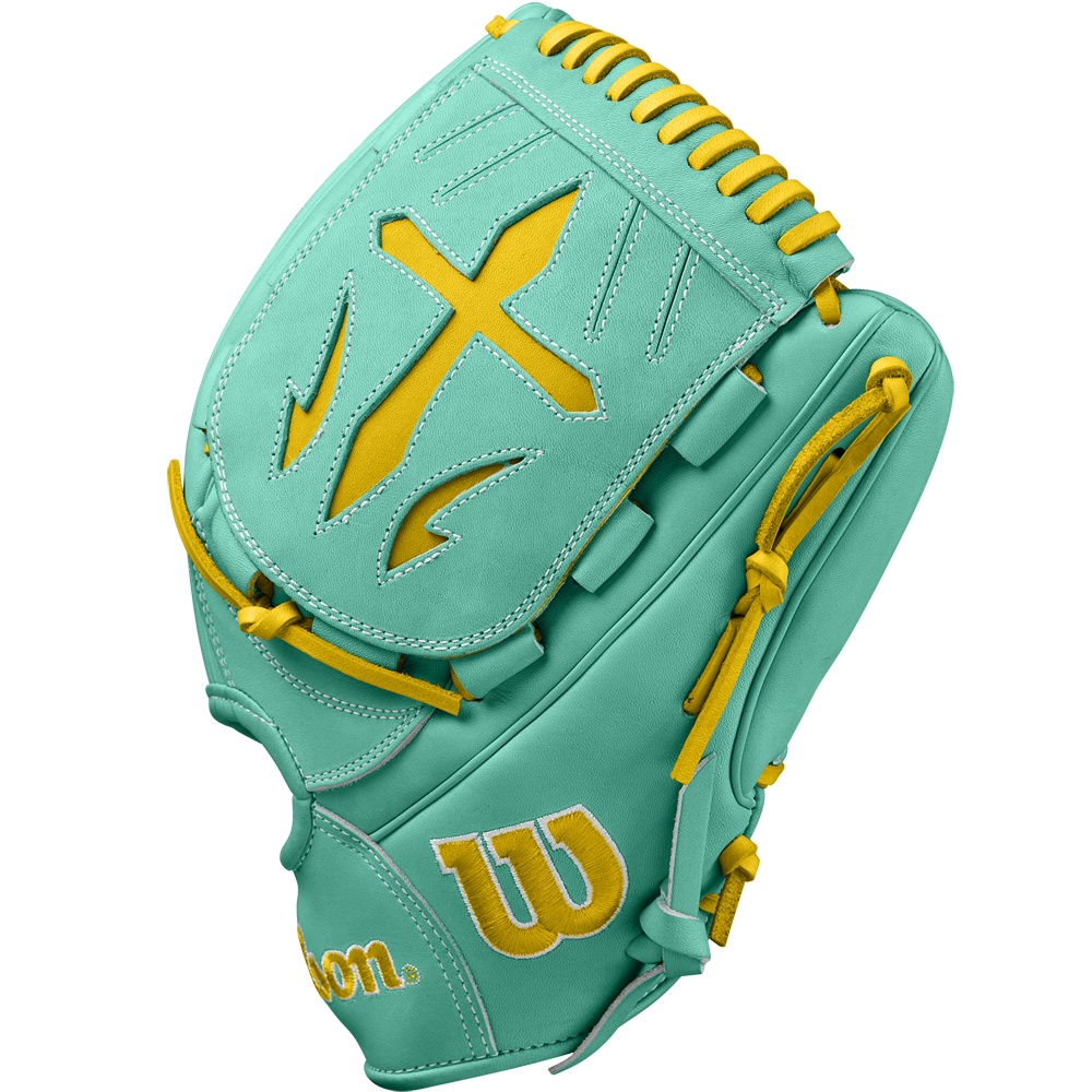 The Wilson A2000 B23 12" Baseball Glove features a teal design with yellow accents, a large yellow cross on the back, yellow stitching, and a Pro Stock leather build with a yellow W logo near the wrist.