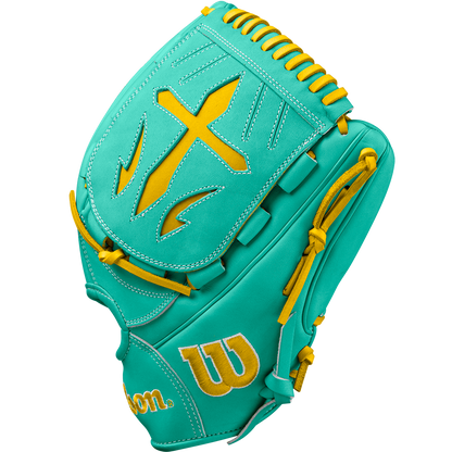 The Wilson A2000 B23 12" Baseball Glove features a teal design with yellow accents, a large yellow cross on the back, yellow stitching, and a Pro Stock leather build with a yellow W logo near the wrist.
