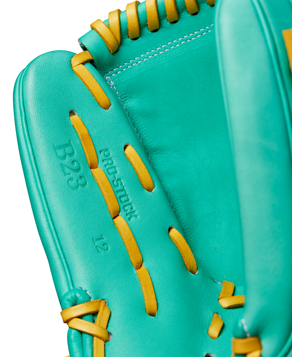 Close-up of a teal Wilson A2000 B23 12" Baseball Glove with yellow laces, featuring embossed B23 and prostock text on the palm. Crafted from Pro Stock leather with detailed stitching for FALL 2024 (WBW10227012).