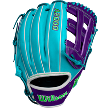 The Wilson A2000 DW5 12" Baseball Glove (Winter 2024: WBW10252212) features turquoise and purple Pro Stock leather, white accents, and bright green embroidery, shown from a side angle on a plain background.