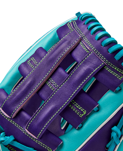 Close-up of the Wilson A2000 DW5 12" Baseball Glove (WBW10252212), showcasing purple Pro Stock leather with teal accents, teal stitching and laces, and a woven web—expertly crafted for Winter 2024.