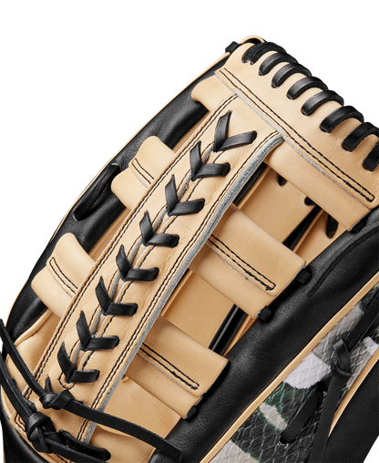 Close-up of a Wilson A2000 1810 12.75" Baseball Glove (Winter 2024), made of tan and black Pro Stock leather with black lacing, highlighting its detailed texture, stitching, and craftsmanship.