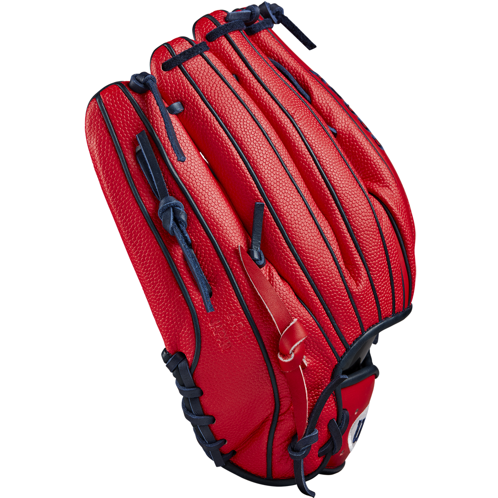 A Wilson A2000 MY7 12.5" Masataka Yoshida GM outfield glove in bright red features dark blue laces and trim, shown closed to highlight the leather texture, set against a plain white background.