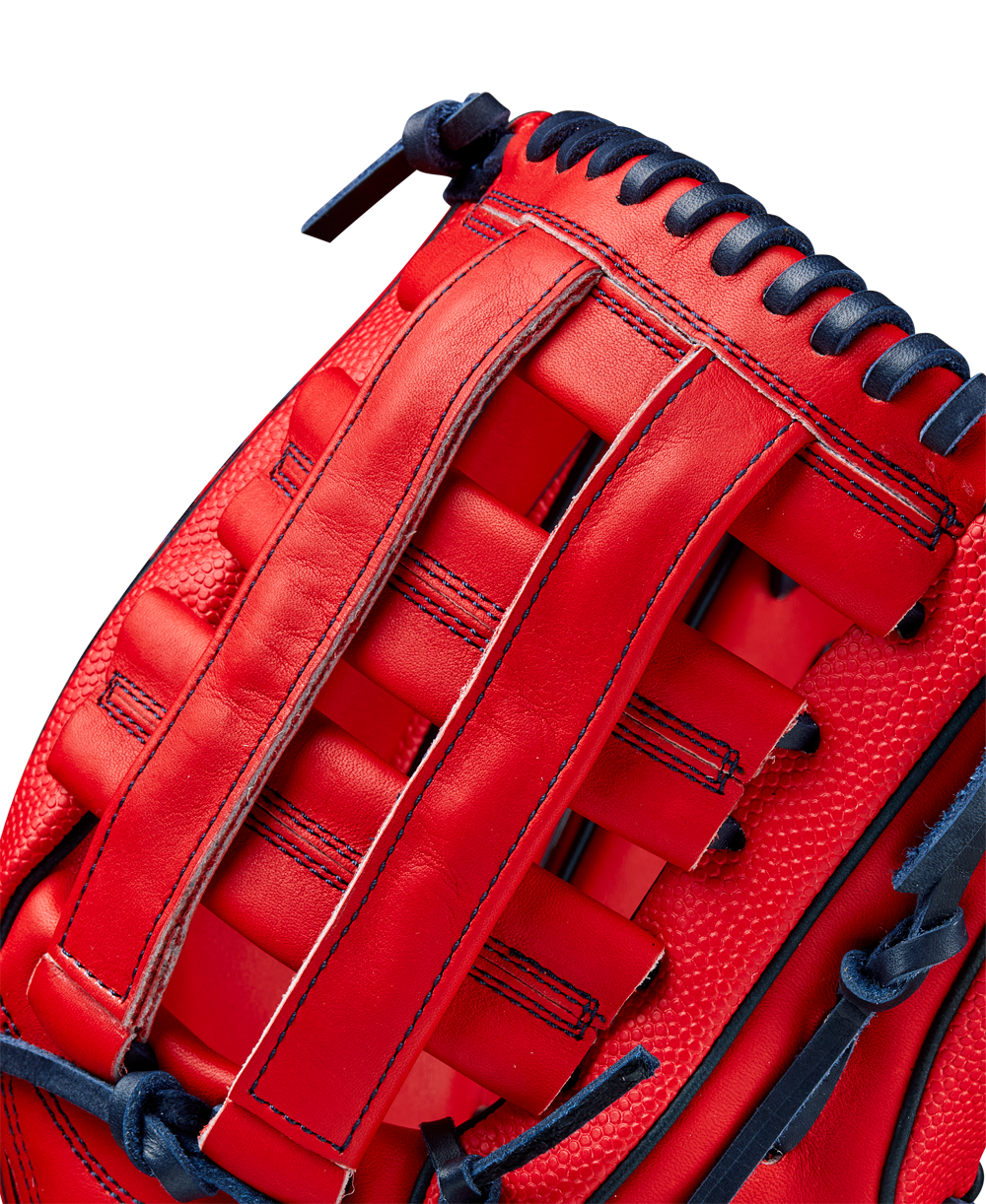 Close-up of the Wilson A2000 MY7 12.5" Masataka Yoshida GM Baseball Glove (WBW102529125) in red with navy lacing, detailed stitching, woven web design, and textured surface.