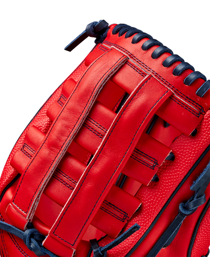 Close-up of the Wilson A2000 MY7 12.5" Masataka Yoshida GM Baseball Glove (WBW102529125) in red with navy lacing, detailed stitching, woven web design, and textured surface.