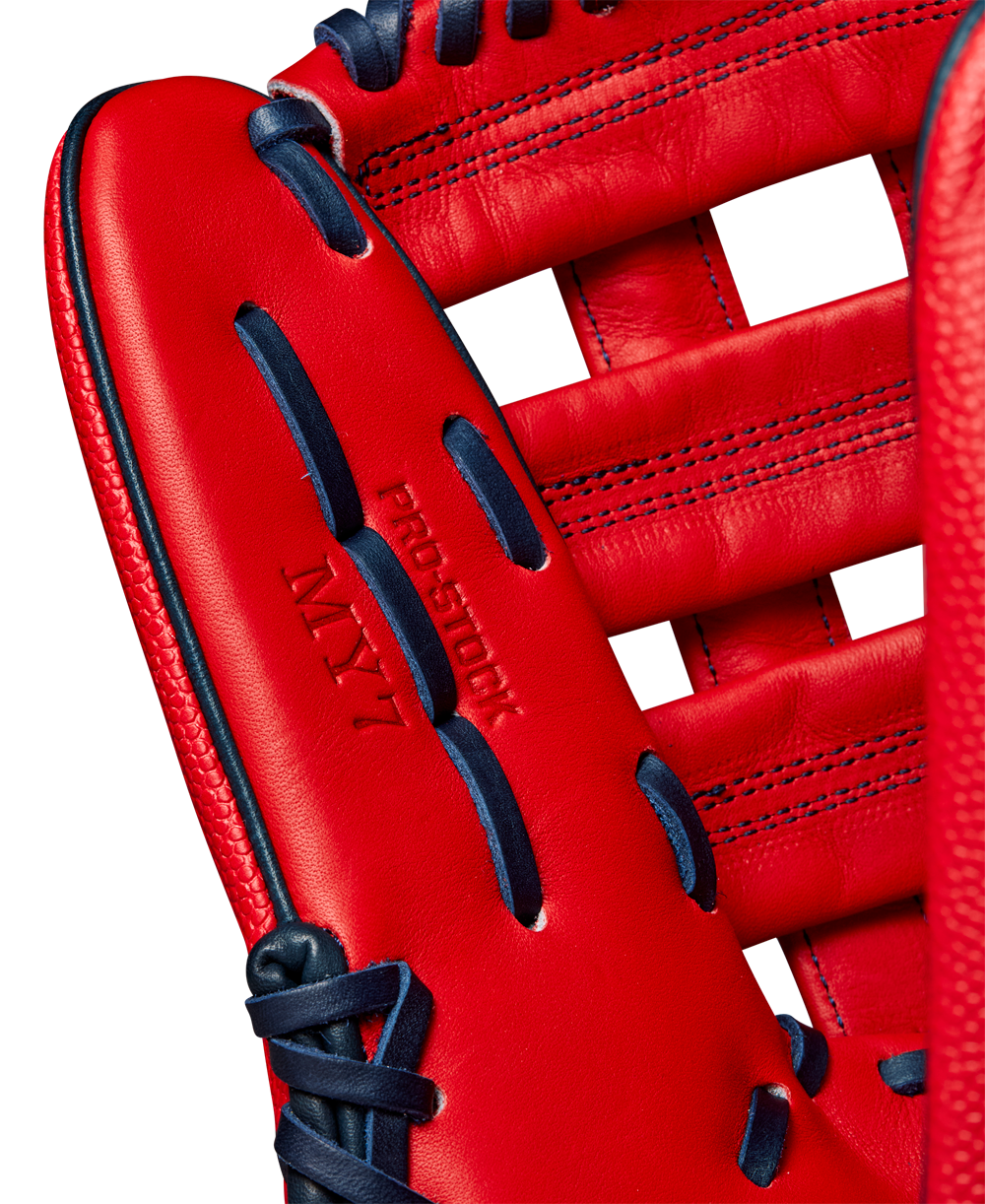 Close-up of the Wilson A2000 MY7 12.5" Masataka Yoshida GM Baseball Glove (WBW102529125) in bright red with dark blue laces. The intricate stitching and PRO STOCK leather texture highlight Wilson’s premium craftsmanship.