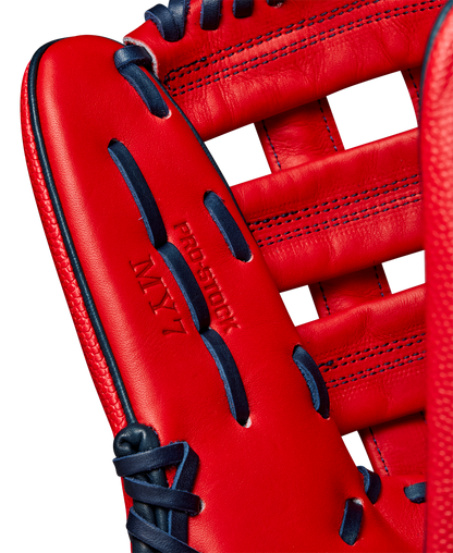 Close-up of the Wilson A2000 MY7 12.5" Masataka Yoshida GM Baseball Glove (WBW102529125) in bright red with dark blue laces. The intricate stitching and PRO STOCK leather texture highlight Wilson’s premium craftsmanship.