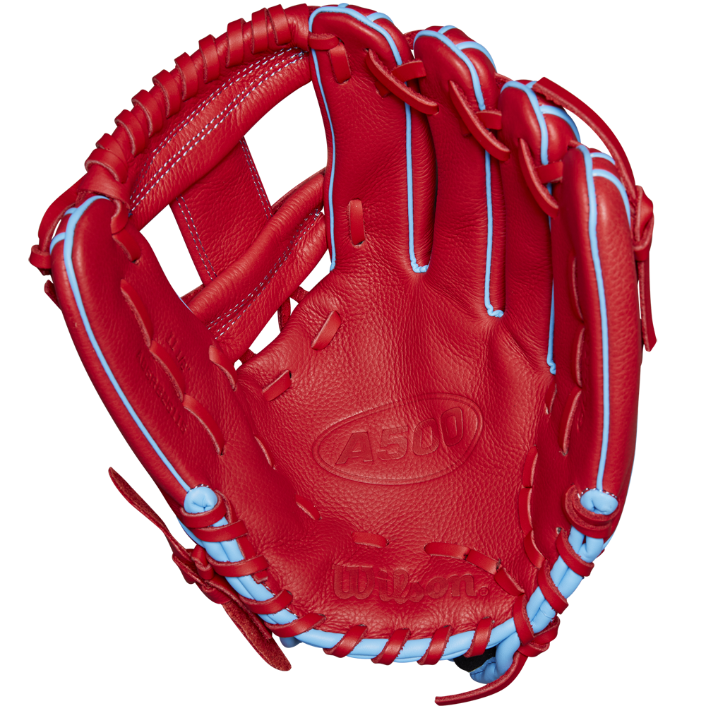 The Wilson A500 11.5" Baseball Glove (WBW102540115) by Wilson features a bright red design with light blue laces, detailed stitching, a webbed pocket, and the A500 logo embossed in the palm center.