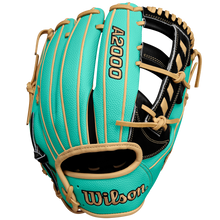The Wilson A2000 1716SS 11.5" Baseball Glove (WBW102547115) features turquoise and tan Pro Stock leather, black lacing, an open web, bold stitching, and Wilson embroidery on the wrist. Available Spring 2025.