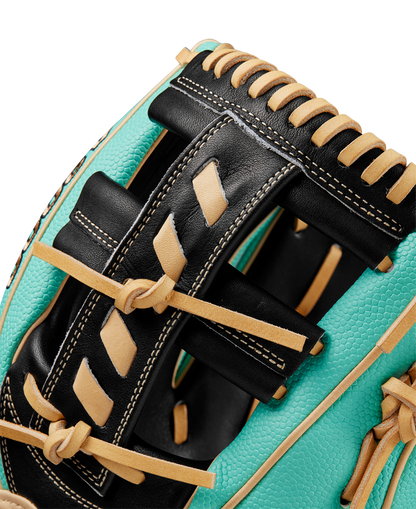 Close-up of the Wilson A2000 1716SS 11.5" Baseball Glove (SPRING 2025: WBW102547115) featuring turquoise Pro Stock leather, black and tan lacing, and detailed stitching that showcases the glove’s quality craftsmanship.