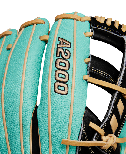 Close-up of the Wilson A2000 1716SS 11.5" Baseball Glove (WBW102547115), featuring turquoise and tan Pro Stock leather, black and gold A2000 embroidery, black laces, and visible stitching. Brand: Wilson. Spring 2025 release.