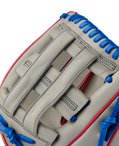 Close-up of the Wilson A900 PF12 12" Baseball Glove (WBW10257112), a light gray youth glove with blue laces, red trim, and detailed stitching—perfect Pedroia Fit utility glove for young players.