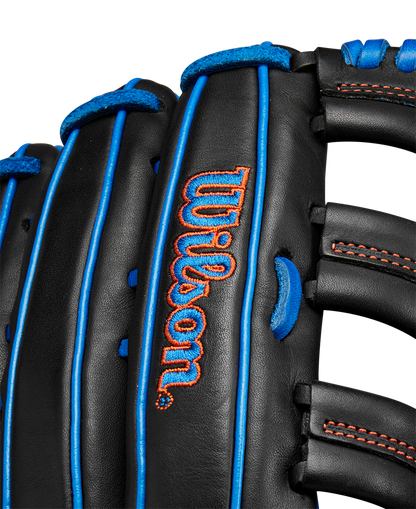 Close-up of the black Wilson A1000 PF1892 12.25" Baseball Glove (WBW1025831225) in Full Grain leather, with blue laces, red stitching, and the Wilson logo embroidered in red and blue.