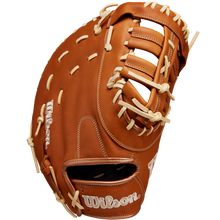 The Wilson A1000 1620 12.5" First Base Mitt (WBW102587125) features full-grain leather, tan laces, an open web, and the Wilson logo stitched in white on the thumb and wrist strap.