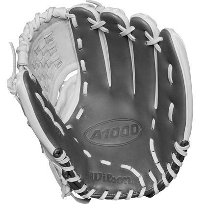 A black and white photo of the Wilson A1000 P12 12" Fastpitch Glove (WBW10259212) with white laces, made from Full Grain leather, features the Wilson brand and model name clearly visible on the palm.